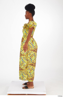  Dina Moses A poses dressed standing whole body yellow long decora apparel african dress 0003.jpg